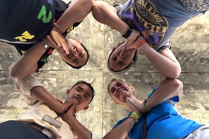 2-D Angkor temple tour with one sunrise in A/C vehicle and guide. - Day 1 at 8:00 am: Ta Prohm, Pre Rup, Banteay Srei, and Banteay Samre