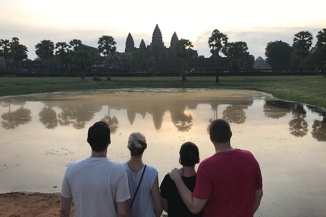 2-D Angkor temple tour with one sunrise in A/C vehicle and guide. - Price and what you actually pay: tour fee plus temple admission