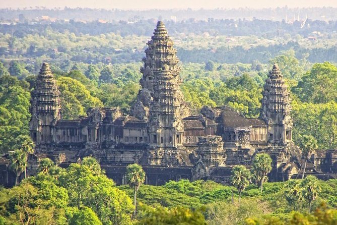 2-Day Best of Angkor Wat and Tonle Sap Lake Tour - Day 1 in Angkor Wat: tickets, Angkor Thom walls, and the Bayon faces