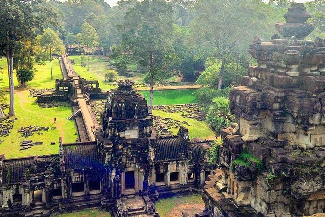 2-Day Treasure of Angkor& The Jungle plus Bantey Srey and Beng Mealea temple - Angkor Thom highlights: Bayon faces and the royal terraces