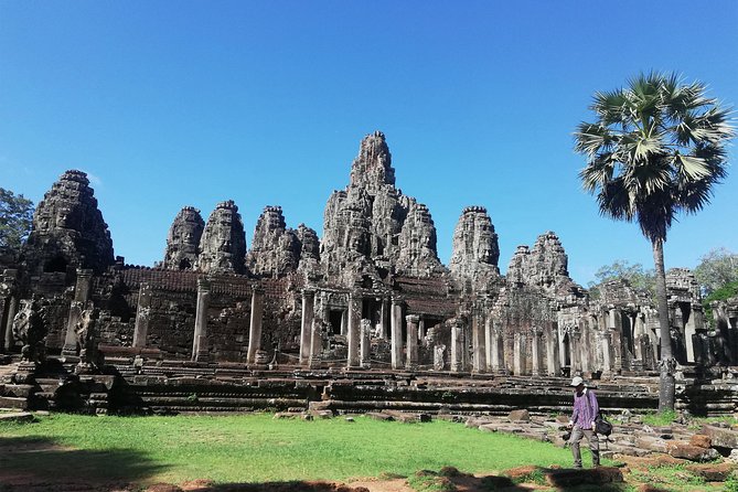 Afternoon Angkor Wat Private Tour with Sunset - Phnom Bakheng Mountain at sunset: where the day turns golden