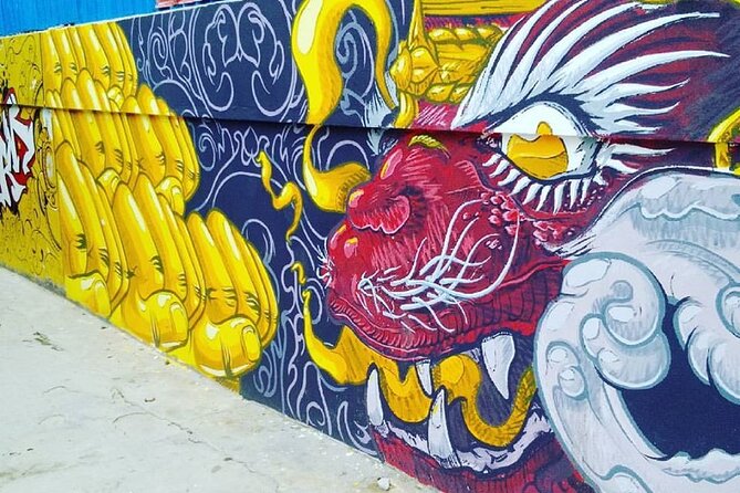 An Afternoon of Contemporary Art in Phnom Penh by Tuk Tuk - Stop 1: Wat Phnom Area for Street Art With a Shadowy Edge