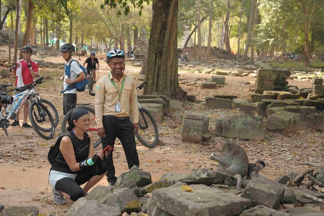 Angkor Sunrise Bike Tour with Lunch Included - Ta Nei Temple and Ta Prohm: jungle stops that break the crowds