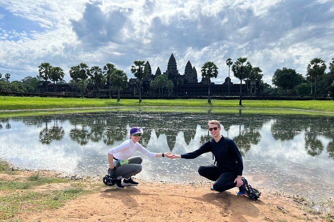 Angkor Sunrise Bike Tour with Lunch Included - Bikes, guides, and the photo advantage with Pok