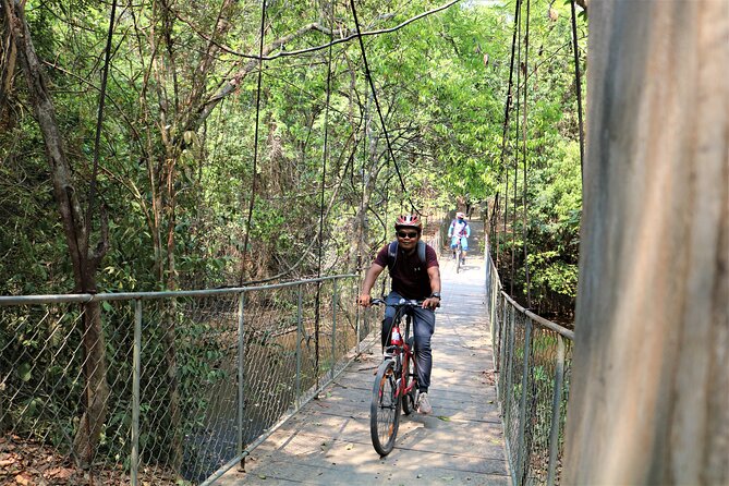 Angkor Sunrise Expedition Cycling Through Serene Backroads - Angkor Thom Wall Cycling: Moat One Side, Jungle the Other