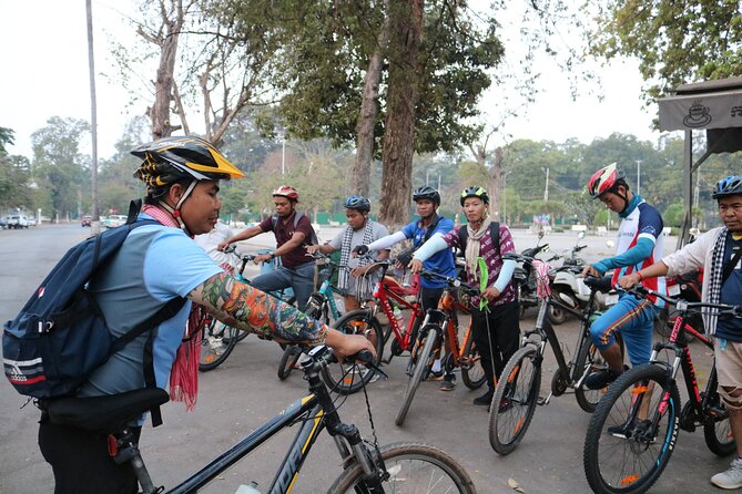 Angkor Sunrise Expedition Cycling Through Serene Backroads - Bayon Temple and Those 200 Faces