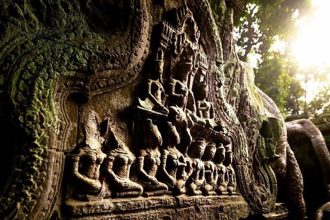Angkor Sunrise Half-Day Tour with Private Vehicles & Tour Guide - Bayon Temple stop: the smiling faces feel more intense up close