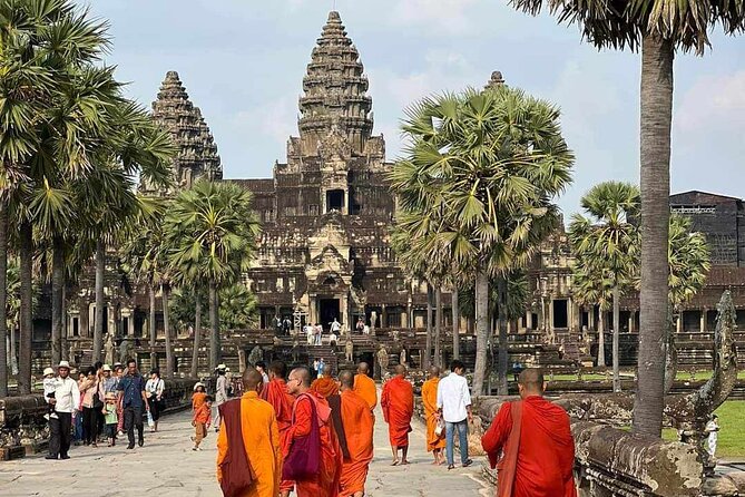 Angkor Wat, Angkor Thom Ancient Capital, Ta Promh Temple - Price and value: $52 covers the tour, but tickets add up