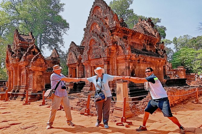 Angkor Wat & Banteay Srey Tour - Bayon Temple and Angkor Thom: smiling faces, real damage history