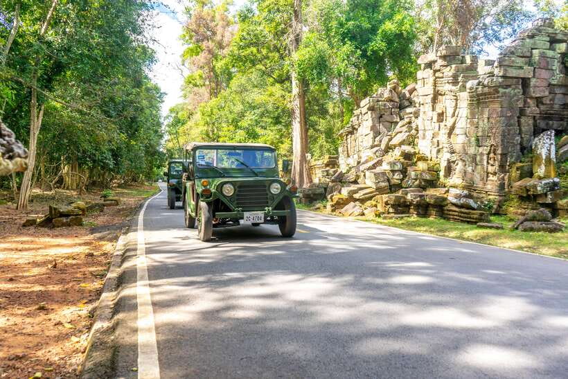 Angkor Wat: Guided Jeep Tour Inclusive lunch at local house - Ta Prohm’s jungle ruins, vines, and crumbling stone