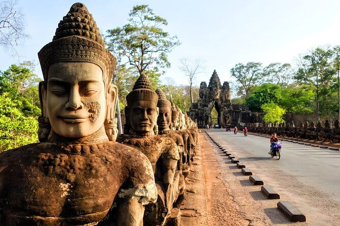Angkor Wat & Small Tour with Bonteay Srei Temples - Angkor Wat at sunrise, where the guide helps you read the building