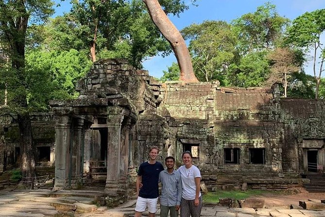 Angkor Wat: Sunrise or Sunset Tours with Tuk Tuk - Ta Prohm: the temple where trees steal the show