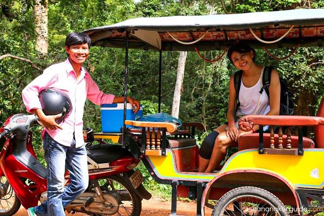 Angkor Wat Sunrise Private Tour via Tuk Tuk from Siem Reap - Ta Prohm jungle roots and Bayon smile faces, with a steady pace