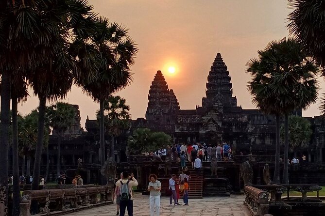Angkor Wat Sunrise Tour - Ta Prohm: tree roots, carved bas reliefs, and why it feels different