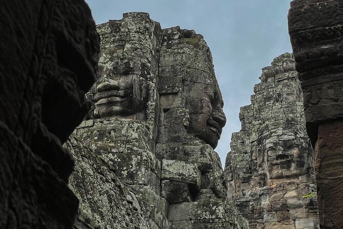 Angkor Wat Sunrise Tour By E-Bike Experience With Breakfast Included - Riding through Angkor Thom gates and then reaching Bayon’s faces