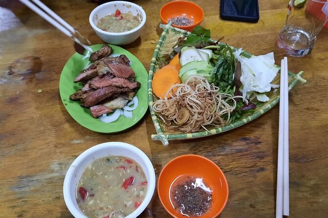 Authentic Walking Food Tour with Local Guide - Another monument stop: Num Krok and the snack-stop rhythm