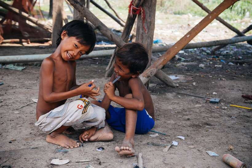 Back to Basics: Village Life Tour from Siem Reap - Lunch by the water: hammock time, coals, and eating with your hands