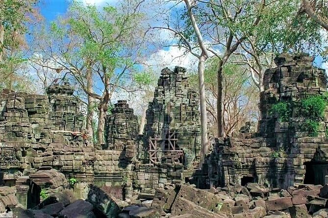 Banteay Chhmar Temple & Silk Farm Private Day Trip from Siem Reap - Banteay Chhmar Temple: Stone Carvings and Collapsed Galleries in Jungle Quiet