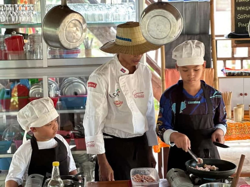 Battambang: Cooking Class and Market Touring - Inside the local home: rolling up sleeves, cooking 3 dishes