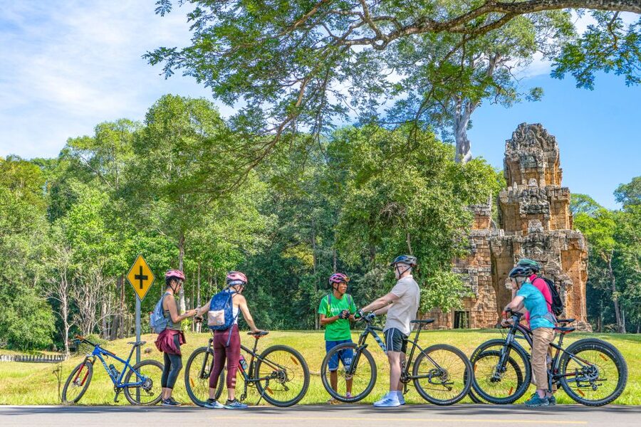 Cycle Angkor Backroad Bike Tour / E-Bike or Tuk Tuk - Riding into Angkor Thom: elephants, giant faces, and the “54 provinces” moment