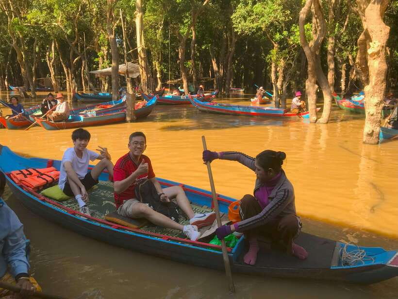 Exploring the Enchanting Kampong Phluk Floating Village - Flooded Forests: Surreal Roots, Submerged Trunks, Quiet Scale