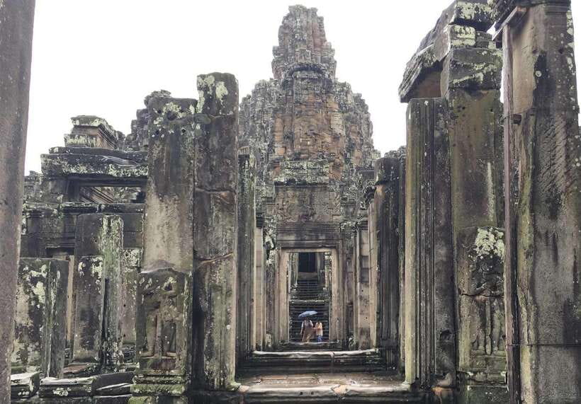 From Phnom Penh: Angkor Wat, Bayon, and Ta Prohm Day Trip - Bayon and the smiling faces, plus the quiet corridors