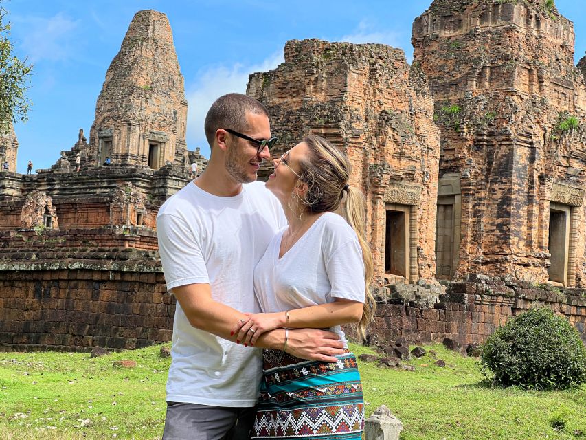 From Siem Reap: Angkor Wat Sunrise and Temples E-Bike Tour - Bayon and Angkor Thom Victory Gate: Smiling Faces, Real Scale