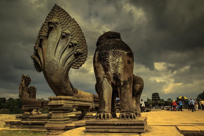 Full-Day Guided Sunset Tour of Angkor Wat - Bayon Temple faces and the meal pause that keeps you on track