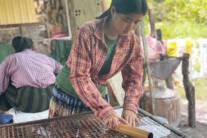 Full day tour by bicycle & tuk tuk,bamboo train,bat cave,villages - Food and small business stops, plus the rice wine lesson