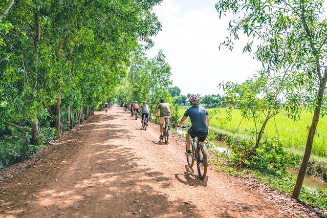 Grand Tour-Ek Phnom. Baset. Bamboo Train. Wat Banan. Phnom Sampov - The Morning Start: Ta Dumbong Kro Aung Statue And A Quick City Taste