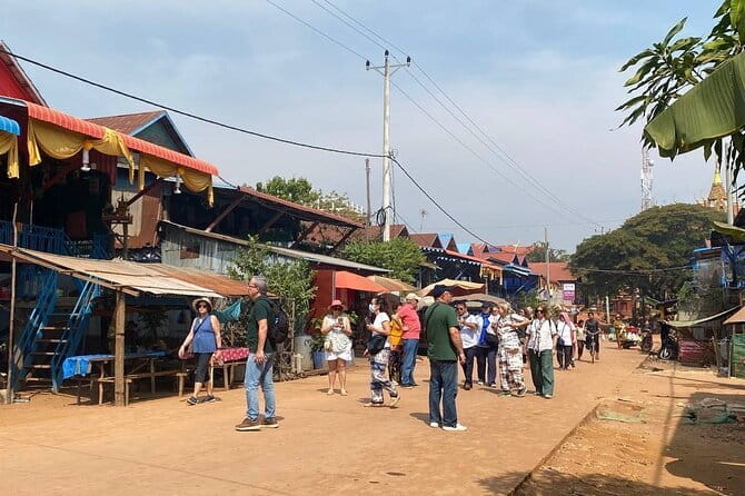 Half Day Kampong Phluk Floating Village and Flooded Forest Tour - Kompong Phluk Flooded Forest by Boat: The Calm Part Where Details Matter