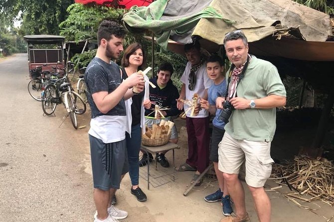 Half day morning bicycle tour to Explore local livelihood and test local snacks - Snack-making at the khrolan bamboo cake factory