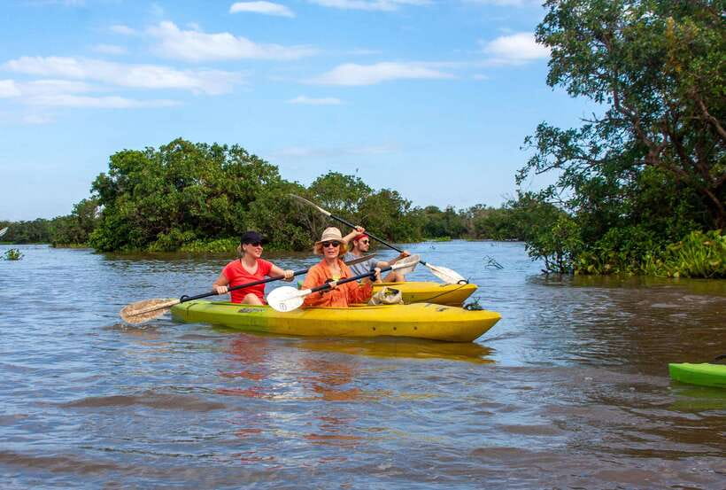 Kayaking & Floating Village in Siem Reap - The first boat ride: seeing Tonle Sap life before you kayak