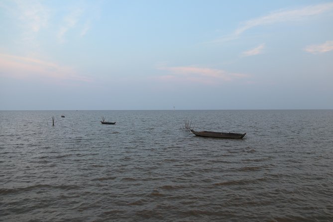 Kompong Phluk Half-Day Tour from Siem Reap - Paddling the flooded forest on a traditional wooden boat