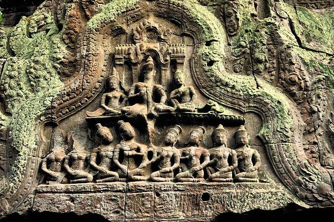 One Day Private Guide Tour of Angkor Thom, Bayon, Ta Phrom & Angkor Wat - Ta Phrom: dark sandstone towers and the feeling of reverence