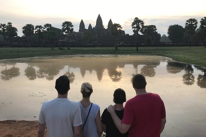 One Day tour with sunrise in car with A/C or Van & Guide. - Angkor Thom’s Major Stops: Bayon Faces, South Gate, and Baphoun
