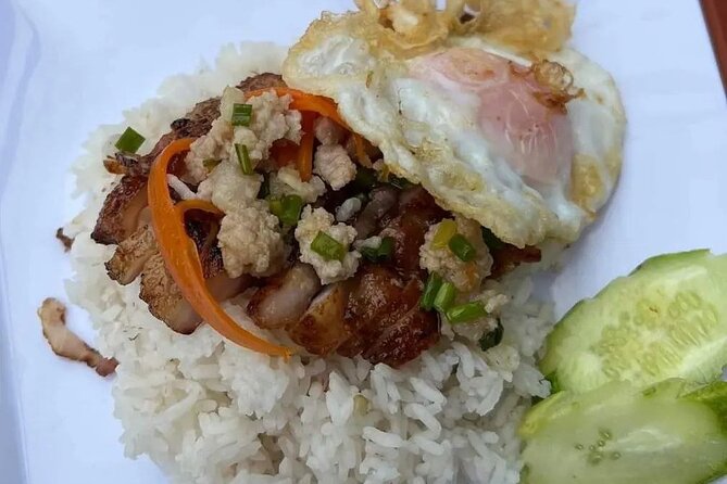 Phnom Penh Local Market & Morning Food Tour Include Drinks - Stop 3 in Central Market: hot-stone beef with Khmer spice