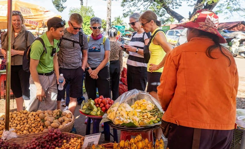 Phnom Penh: Morning Foodie, Market Walking & Street Art Tour - Getting picked up in Phnom Penh by tuk tuk or vespa