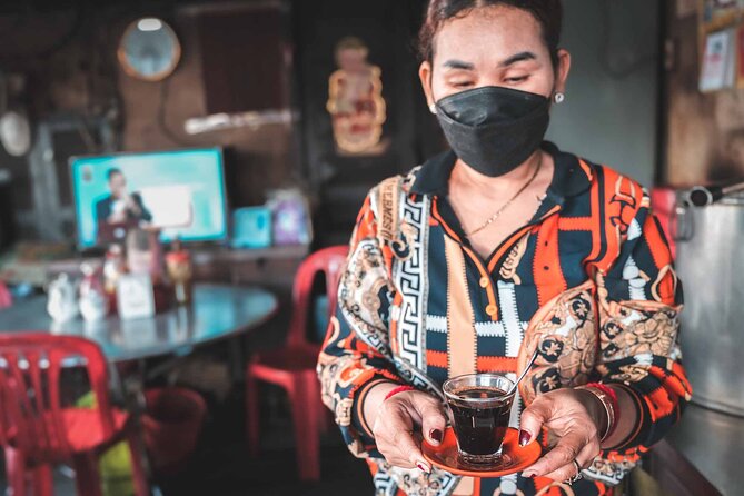 Phnom Penh Morning Market & Food Tour by Tuktuk - Includes All Food & Drinks! - Stop 4: Classic Khmer breakfast, grilled pork and rice with homemade pickles