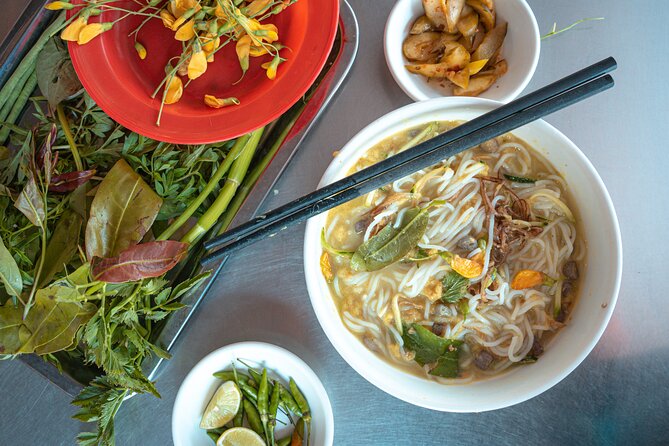 Phnom Penh’s Culinary Underground: Local Food Tour by Tuk-tuk - Stop 2 in Sophath: Khmer curry noodles with ancient roots