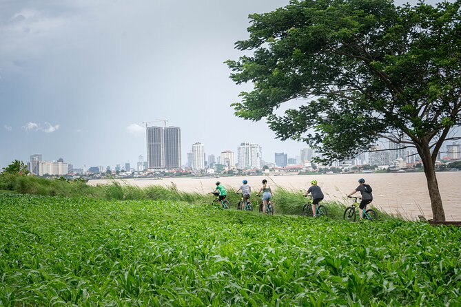 Phnom Penh Silk Island Bike Tour/ E-Bike or Tuk Tuk - More Than Riding: Temples, Markets, and Tofu Stops Along the Way