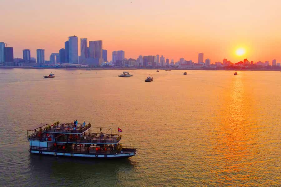 Phnom Penh: Sunset Cruise with Unlimited Beer &Fruit platter - The onboard rhythm: commentary, then sunset, then music
