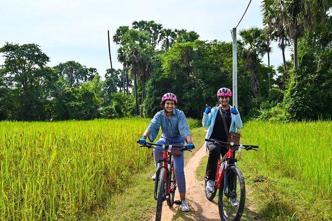 Private Angkor Sunrise Bike Tour Supported By Minivan - Stop 2, Bayon Temple: four-faced towers and everyday bas-reliefs
