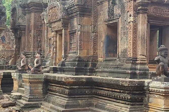 Private Day Angkor Wat Temple and Banteay Srei Temple Tour - Ta Prohm: The Jungle Temple and Its Rooted Mood