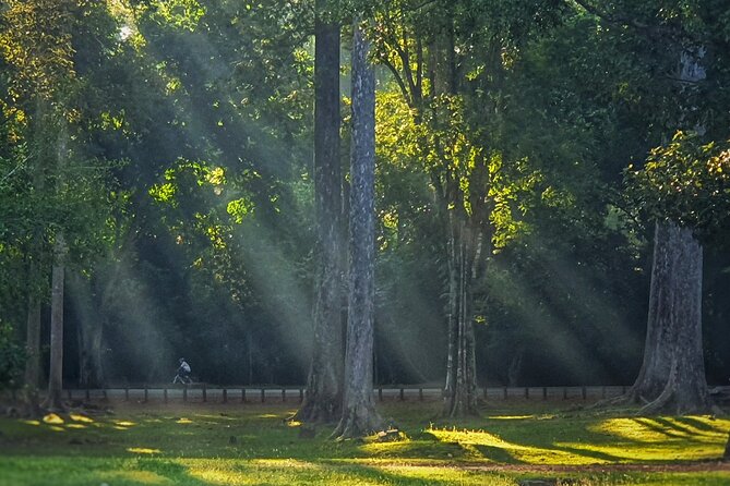 Private Sunrise and Sunset Angkor Park Tour with Rest Mid-Day - Angkor Wat at first light, with tickets handled first