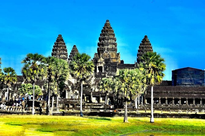 Private Tours Angkor Wat For 2 Days - Day 2: Angkor Wat sunrise, Bayon faces at the South Gate, and Ta Prohm’s rooted drama