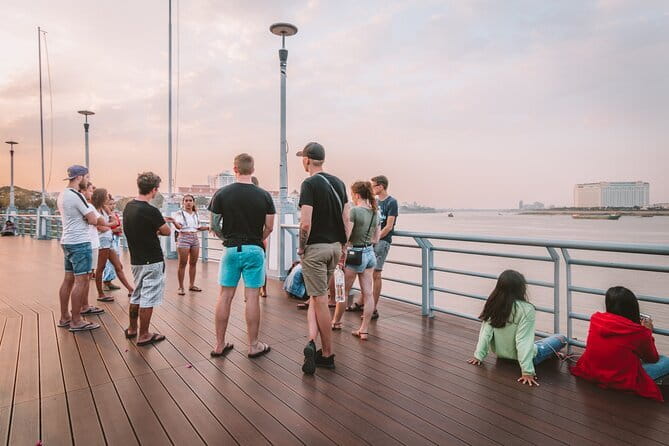 Riverside Walking Tour with Snack, Drinks & Local Ferry Ride - Royal Palace Stop and Ferry Ride at Sunset