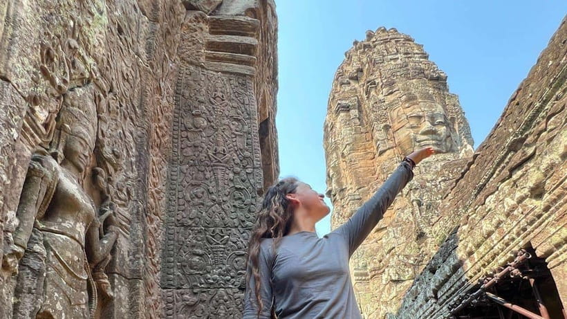 Siem Reap: Angkor Sunrise 1- or 2-Day Guided Temples Tour - Day 2: sunrise at Angkor Wat, then Angkor Thom faces and Ta Prohm trees