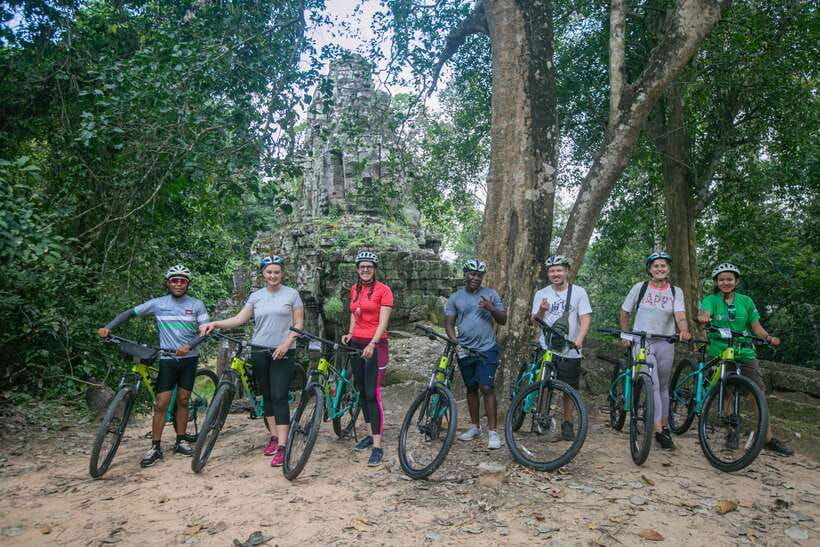 Siem Reap: Angkor Sunrise 2 Days Guided Bike Tour - Angkor Thom, Bayon, and Preah Khan: moving through the city of temples