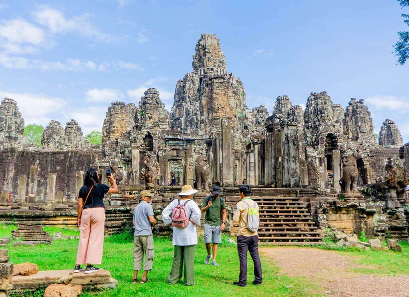 Siem Reap: Angkor Sunrise Jeep Tour / SUV Car Available - Heading to Angkor Thom: stone sculptures, then Bayon’s cultural meaning